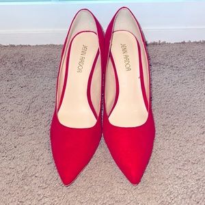 Jenn Ardor red heels